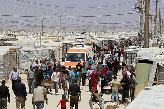 Refugiats sirians al camp de refugiats d'Al-Zaatri a la ciutat de Mafraq, a Jordània, prop de la frontera amb Síria.