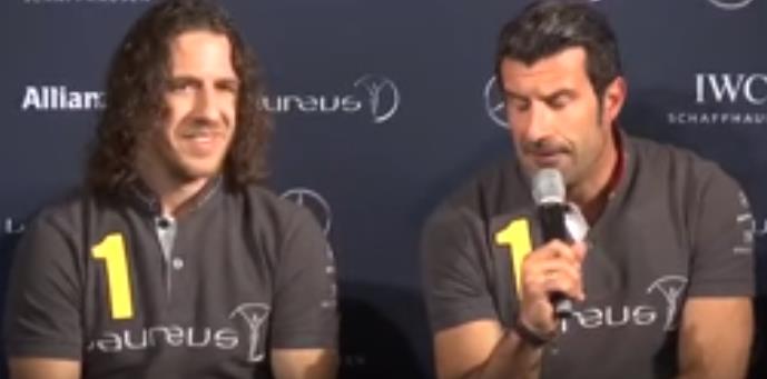 Luis Figo (esquerra) amb Carles Puyol.