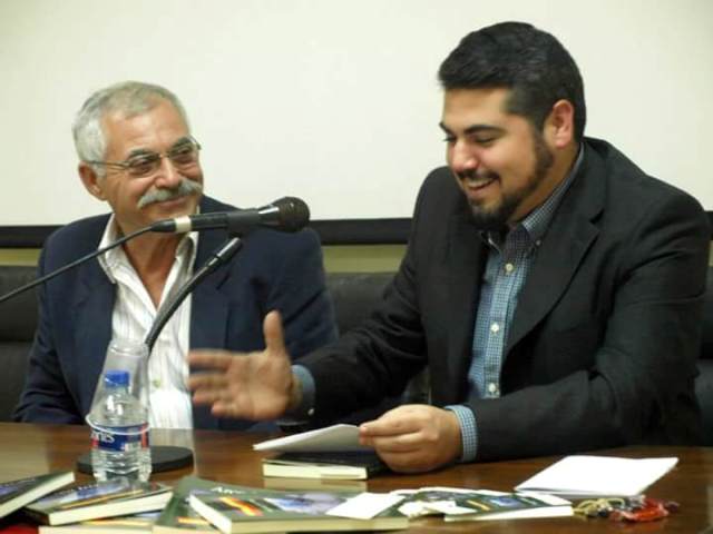 Mario García Montalbán i el portaveu d'Esquerra-Pego Saül Ortolà durant l'acte