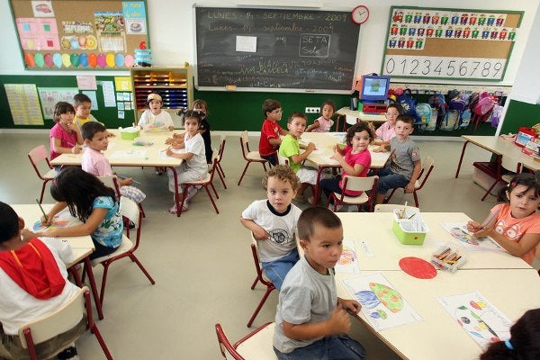 Xiquets en l'aula d'un col·legi públic.