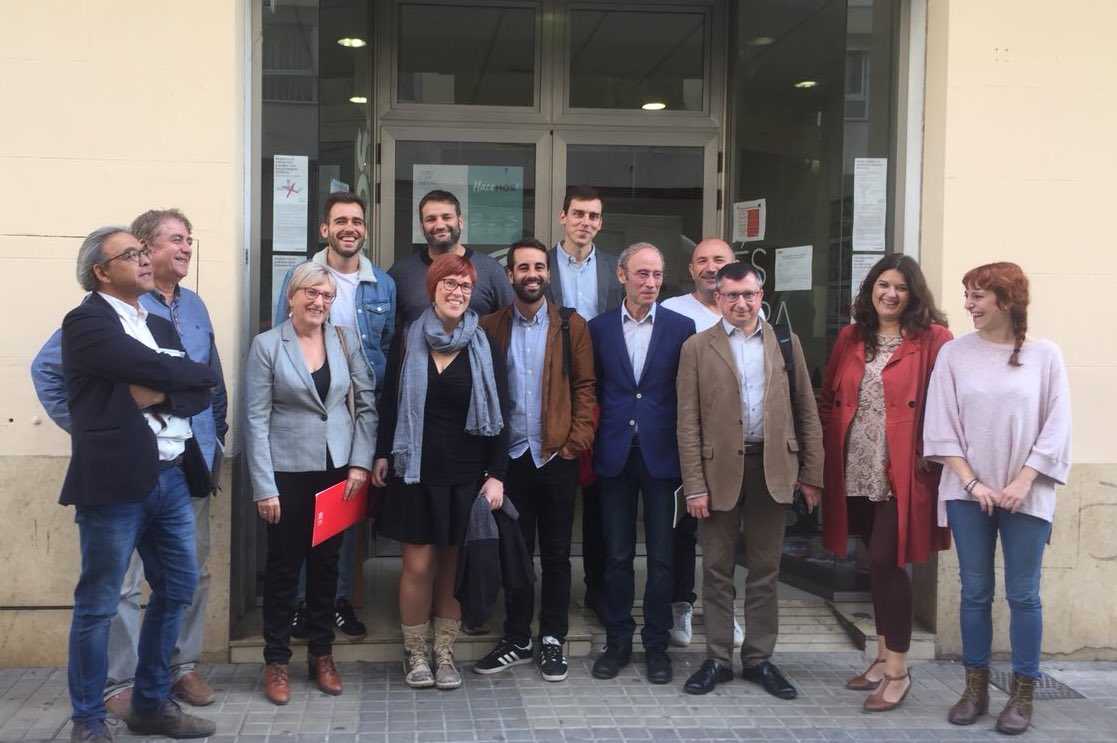 Els representants del partits signants de l'Acord del Botànic, reunits a la seu de Podem a València.