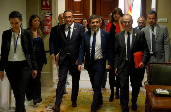 Josep Rull, Jordi Sànchez i Jordi Turull van recollir aquest dilluns les credencials, així com Oriol Junqueras i Raül Romeva. / JAVIER BARBANCHO, ACN