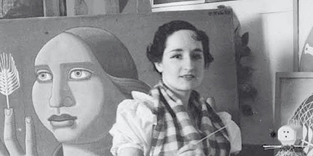 Maruja Mallo (1902 - 1995) davant de la seua obra 'Sorpresa del trigo', 1936.
