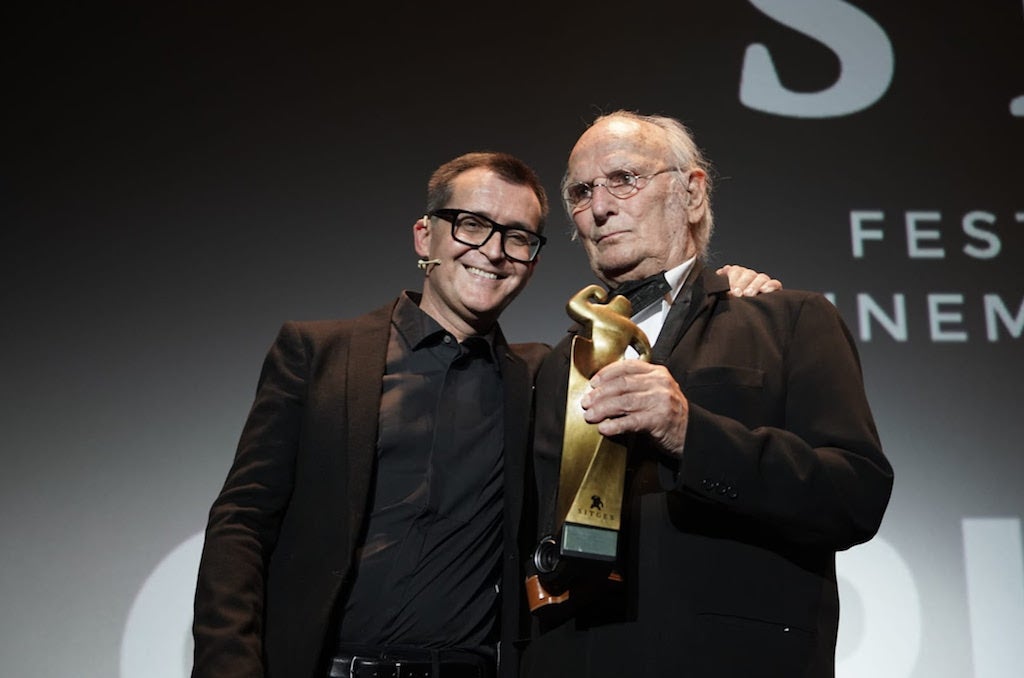 El director del Festival de Sitges, Ángel Sala, amb el cineasta i premi honorífic Carlos Saura el 17 d'octubre de 2021 | ACN